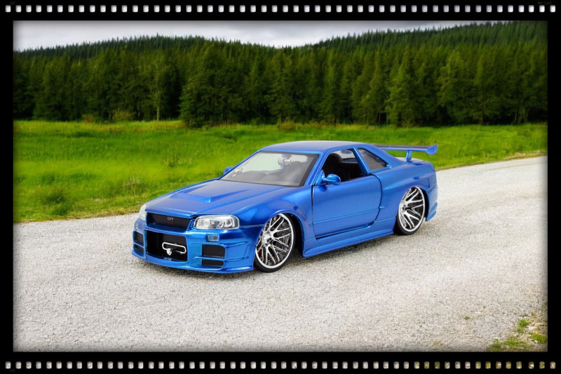 Laad de afbeelding in de Gallery-viewer, Fast &amp; Furious Nissan Skyline GT-R (BNR34) 2002 Blauw JADA 1:24
