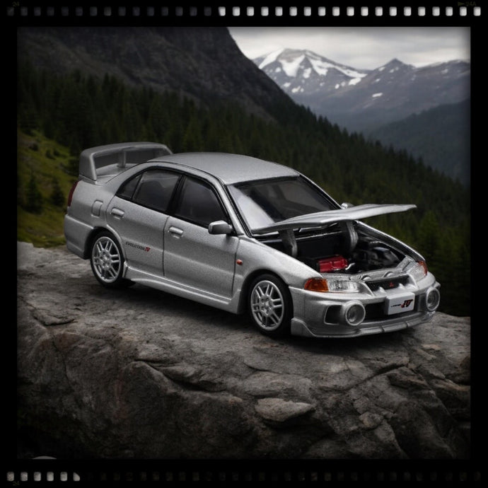 Mitsubishi Lancer Evolution IV Argent POP RACE 1:64