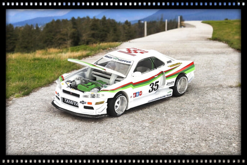 Chargez l&#39;image dans la visionneuse de la galerie, Nissan SKYLINE GT-R (R34) X TAMIYA &quot;LA SAUTERELLE&quot; V1 1999 MINI GT 1:64
