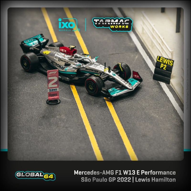 Laad de afbeelding in de Gallery-viewer, Mercedes AMG F1 W13 EQ Performance #44 Lewis Hamilton Sao Paulo Grand Prix 2022 TARMAC WORKS 1:64
