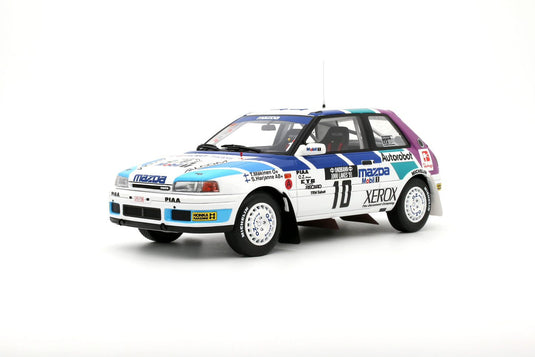 Mazda 323 GTX GR.A BLANC #10 T. MÄKINEN 1000 LACS RALLYE 1991 OTTOmobile 1:18