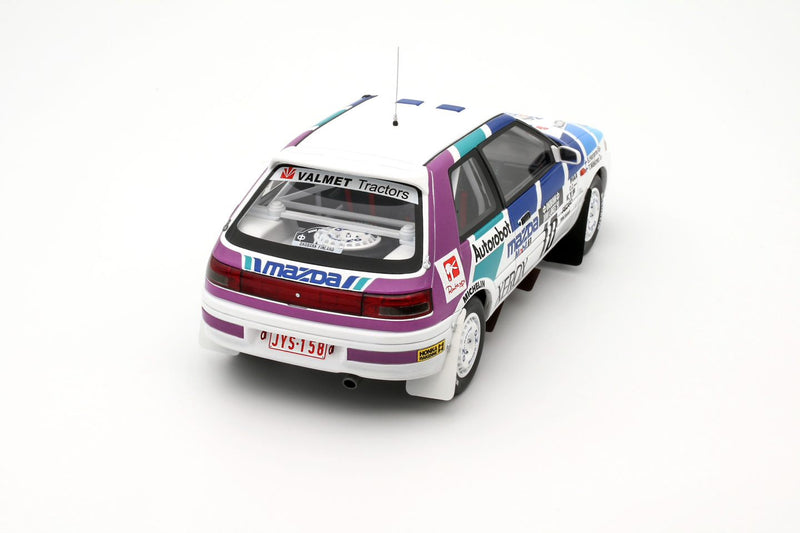 Chargez l&#39;image dans la visionneuse de la galerie, Mazda 323 GTX GR.A BLANC #10 T. MÄKINEN 1000 LACS RALLYE 1991 OTTOmobile 1:18
