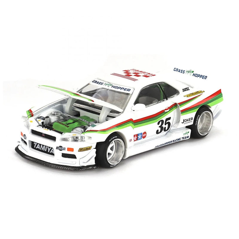 Load image into Gallery viewer, Nissan SKYLINE GT-R (R34) X TAMIYA &quot;THE GRASSHOPPER&quot; V1 1999 MINI GT 1:64
